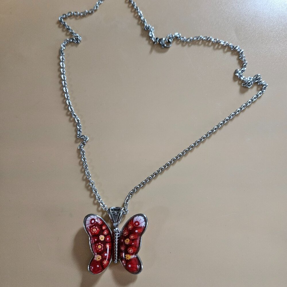 red murano style butterfly pendent necklace 24inces stainless steel  never worn